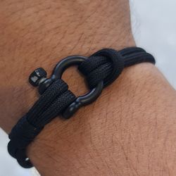 دستبند امگا مشکی نخی
